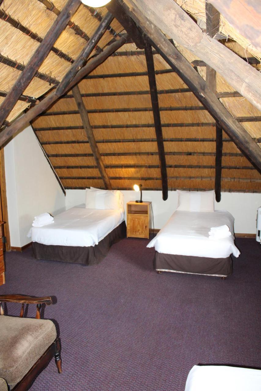 Dragon Peaks Mountain Resort Champagne Valley Extérieur photo